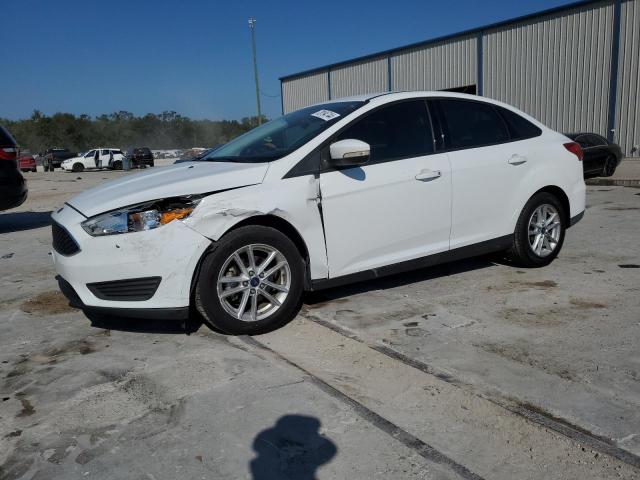 FORD FOCUS SE 2017 with VIN 1FADP3F24HL275152 - Photo from auction