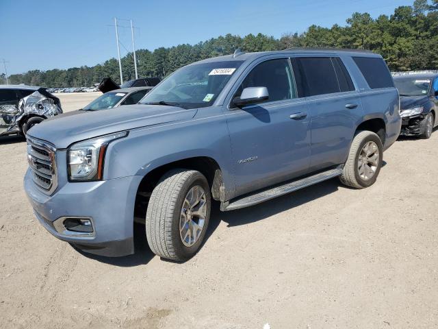 GMC YUKON SLE 2015 with VIN 1GKS1AKC2FR745991 - Photo from auction