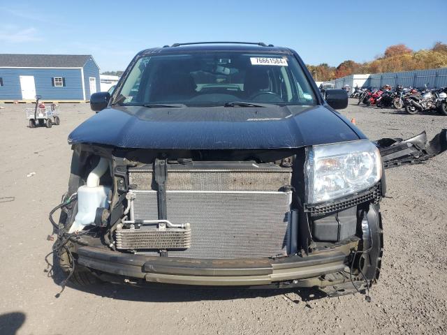 Photo 5 from auction – 2014 HONDA PILOT TOUR with VIN 5FNYF4H95EB047495