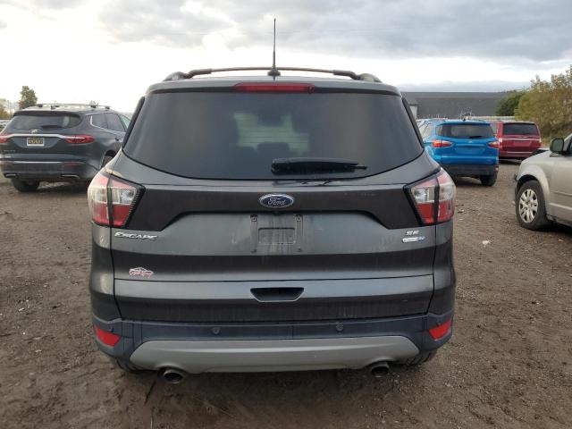 Photo 6 from auction – 2018 FORD ESCAPE SE with VIN 1FMCU9GD6JUC14673