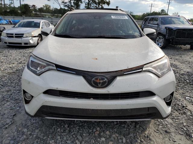 Photo 5 from auction – 2018 TOYOTA RAV4 LIMIT with VIN JTMYFREV6JD115089
