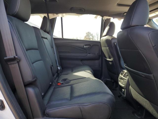 Photo 11 from auction – 2021 HONDA PASSPORT E with VIN 5FNYF8H0XMB032286