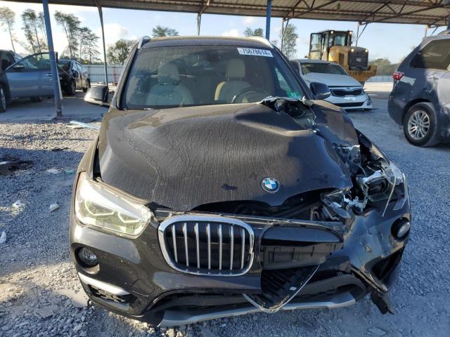 Photo 5 from auction – 2017 BMW X1 XDRIVE2 with VIN WBXHT3Z38H4A52432