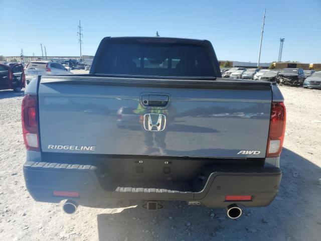 Photo 6 from auction – 2023 HONDA RIDGELINE with VIN 5FPYK3F88PB040972