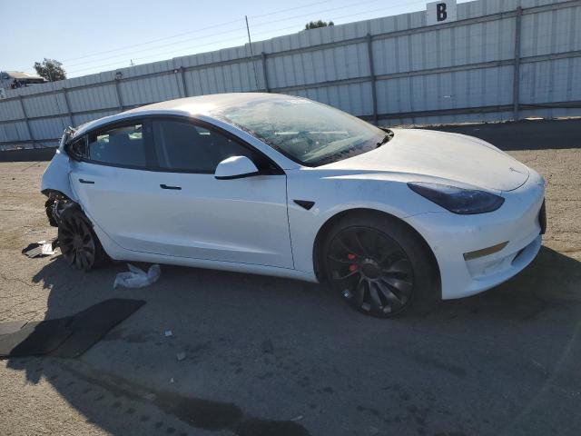 Photo 4 from auction – 2022 TESLA MODEL 3 with VIN 5YJ3E1EC1NF353041