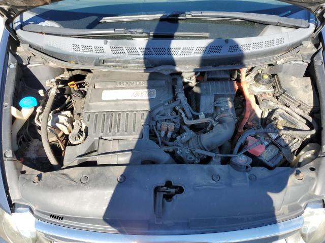 Photo 11 from auction – 2006 HONDA CIVIC HYBR with VIN JHMFA36246S013072