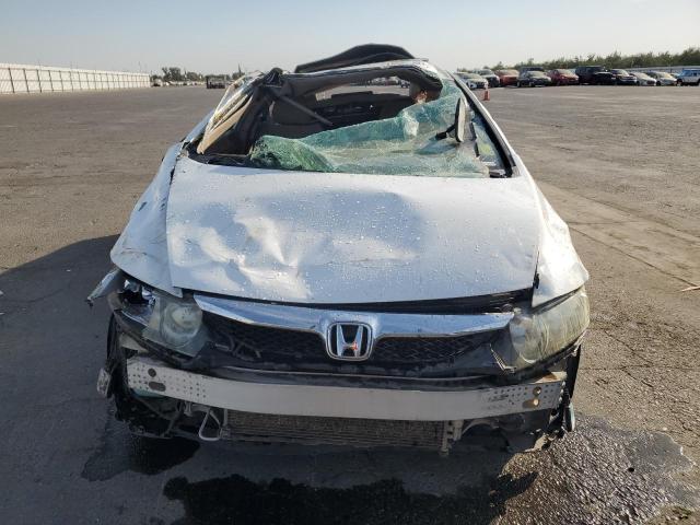 Photo 5 from auction – 2010 HONDA CIVIC EX with VIN 19XFA1F84AE054128