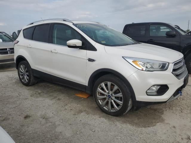 Photo 4 from auction – 2017 FORD ESCAPE TIT with VIN 1FMCU9J97HUB48262