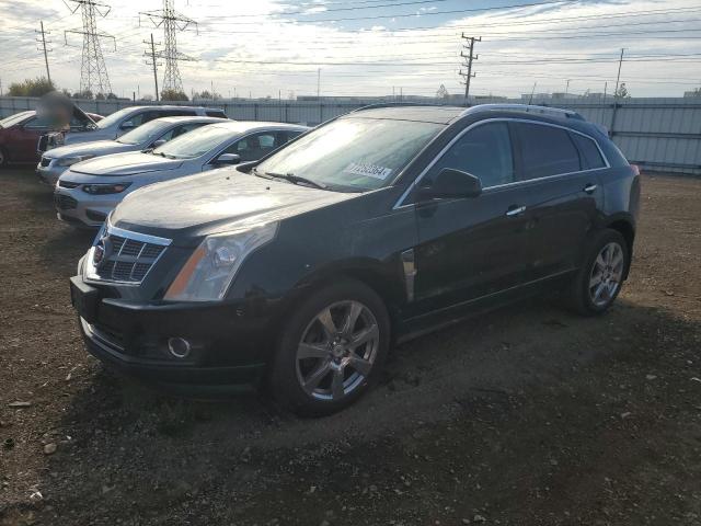 CADILLAC SRX 2011 with VIN 3GYFNBEY5BS675337 - Photo from auction