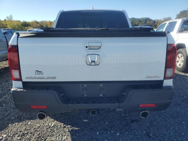 Photo 6 from auction – 2022 HONDA RIDGELINE with VIN 5FPYK3F53NB021006