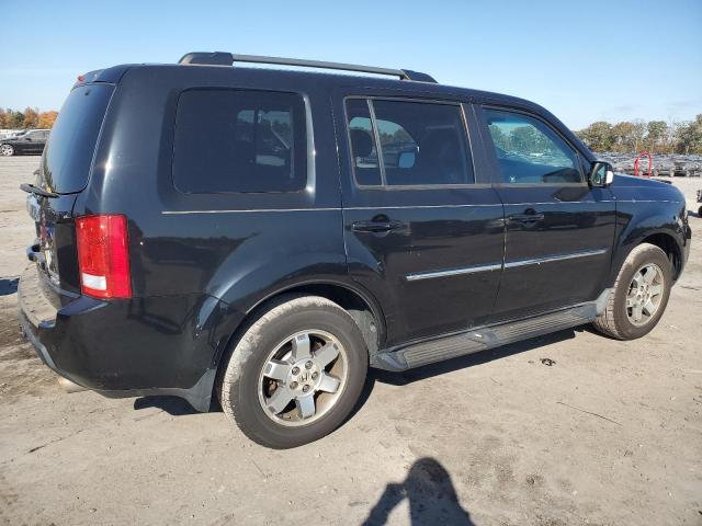 Photo 3 from auction – 2011 HONDA PILOT TOUR with VIN 5FNYF4H94BB004925