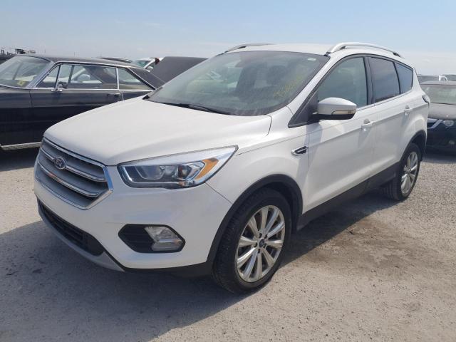 FORD ESCAPE TIT 2017 with VIN 1FMCU0J96HUC56125 - Photo from auction