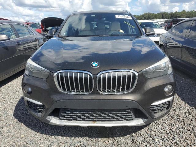 Photo 5 from auction – 2017 BMW X1 XDRIVE2 with VIN WBXHT3C30H5F76855