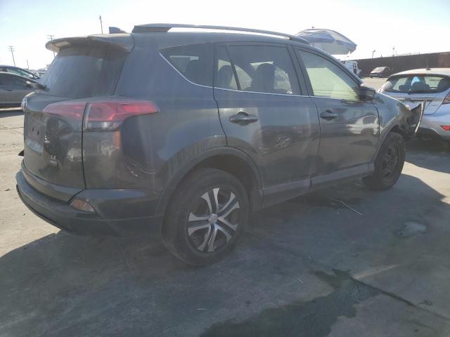 Photo 3 from auction – 2017 TOYOTA RAV4 LE with VIN JTMBFREV7HJ711331