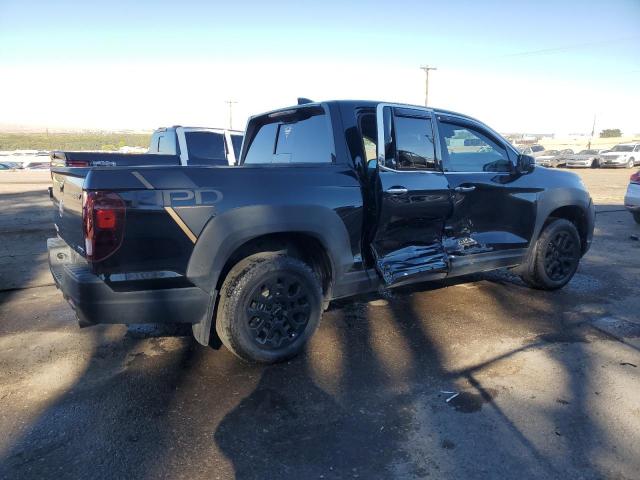 Photo 3 from auction – 2022 HONDA RIDGELINE with VIN 5FPYK3F78NB038787