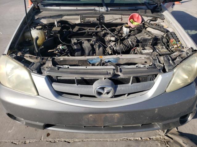 Photo 12 from auction – 2002 MAZDA TRIBUTE LX with VIN 4F2YU09182KM64860