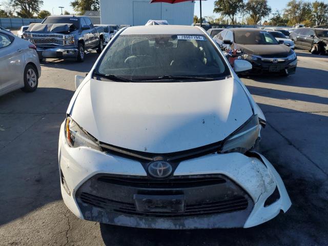 Photo 5 from auction – 2018 TOYOTA COROLLA L with VIN 5YFBURHE8JP810274