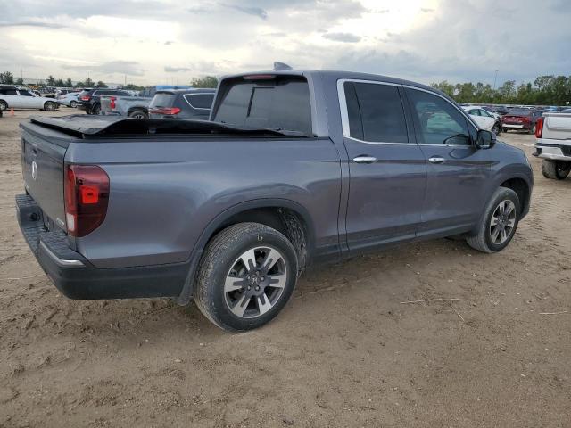 Photo 3 from auction – 2018 HONDA RIDGELINE with VIN 5FPYK3F76JB012800