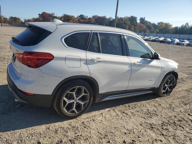 Photo 3 from auction – 2016 BMW X1 XDRIVE2 with VIN WBXHT3C39G5E48788