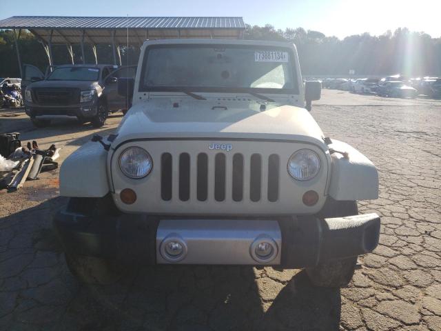 Photo 5 from auction – 2011 JEEP WRANGLER U with VIN 1J4BA5H15BL594001