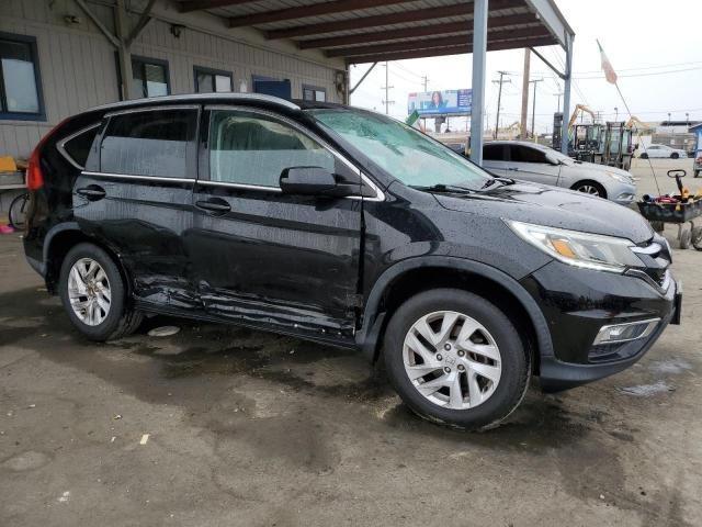 Photo 4 from auction – 2015 HONDA CR-V EXL with VIN 2HKRM3H74FH526643