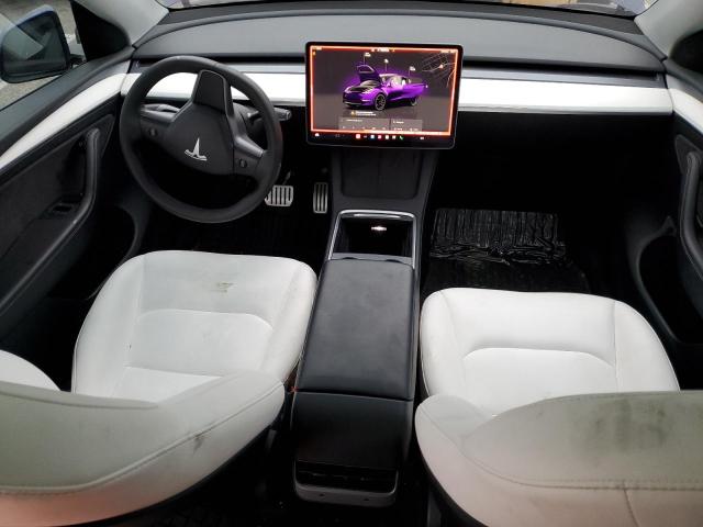 Снимка 8 от търг – 2022 TESLA MODEL Y с VIN 7SAYGDEF2NF524037