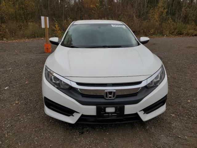 Photo 5 from auction – 2018 HONDA CIVIC LX with VIN 2HGFC2F55JH029783