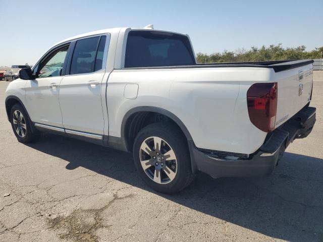 Photo 2 from auction – 2017 HONDA RIDGELINE with VIN 5FPYK3F66HB023328