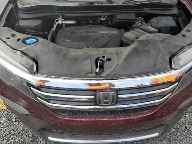 Photo 12 from auction – 2016 HONDA PILOT TOUR with VIN 5FNYF5H99GB014704
