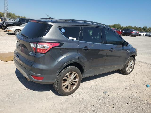 Photo 3 from auction – 2018 FORD ESCAPE SE with VIN 1FMCU9GD7JUA37129
