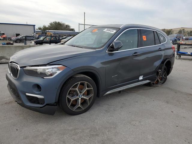 BMW X1 XDRIVE2 2017 with VIN WBXHT3C30H5F72112 - Photo from auction