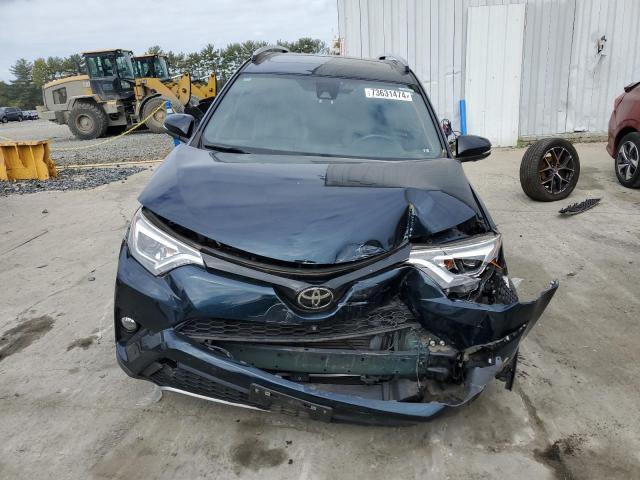 Photo 5 from auction – 2018 TOYOTA RAV4 SE with VIN JTMJFREV9JJ190968