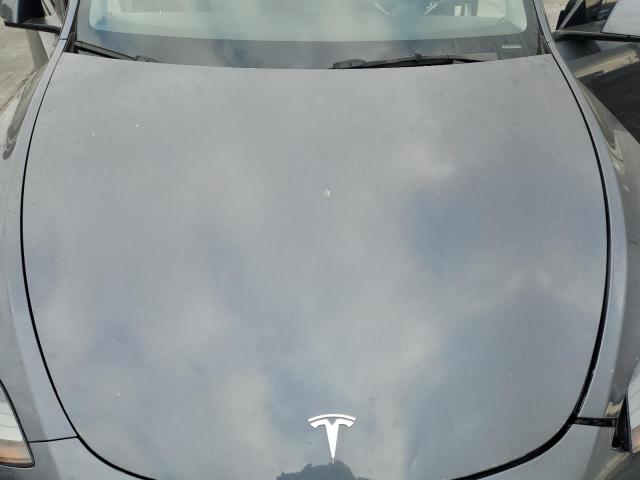 Photo 11 from auction – 2022 TESLA MODEL Y with VIN 7SAYGDEF9NF405384