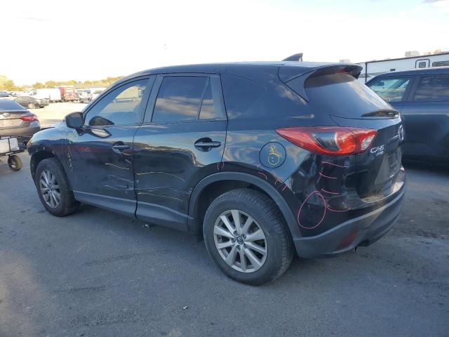 Photo 2 from auction – 2016 MAZDA CX-5 TOURI with VIN JM3KE4CY4G0631175