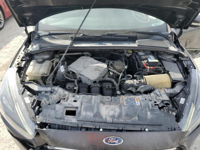 Photo 11 from auction – 2016 FORD FOCUS SE with VIN 1FADP3K21GL243005