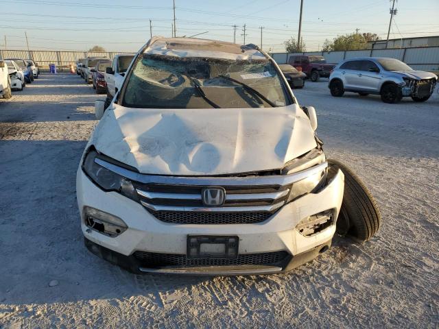 Photo 5 from auction – 2018 HONDA PILOT ELIT with VIN 5FNYF6H04JB049519