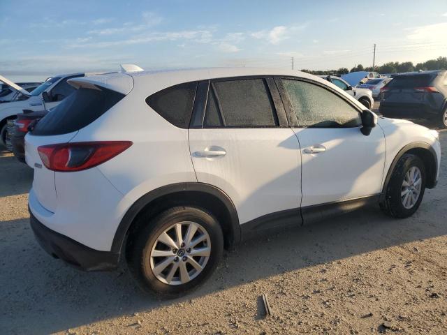 Photo 3 from auction – 2015 MAZDA CX-5 TOURI with VIN JM3KE2CY3F0472751