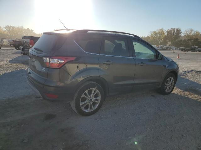 Photo 3 from auction – 2018 FORD ESCAPE SE with VIN 1FMCU0GD9JUC36937