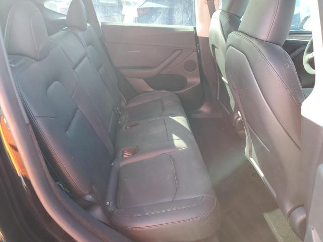 Photo 11 from auction – 2023 TESLA MODEL Y with VIN 7SAYGDEF2PF901727