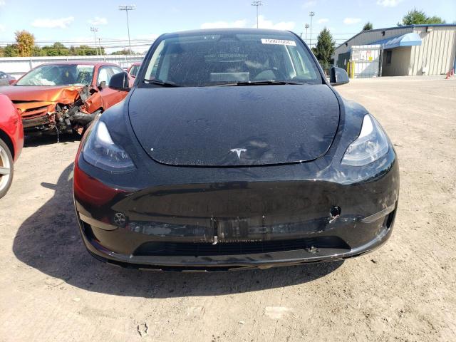 Photo 5 from auction – 2023 TESLA MODEL Y with VIN 7SAYGAEE9PF932592