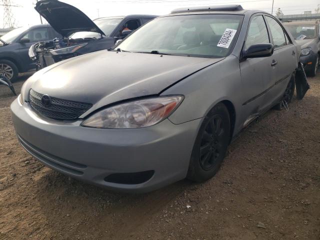 TOYOTA CAMRY LE 2003 with VIN 4T1BF30K03U060556 - Photo from auction