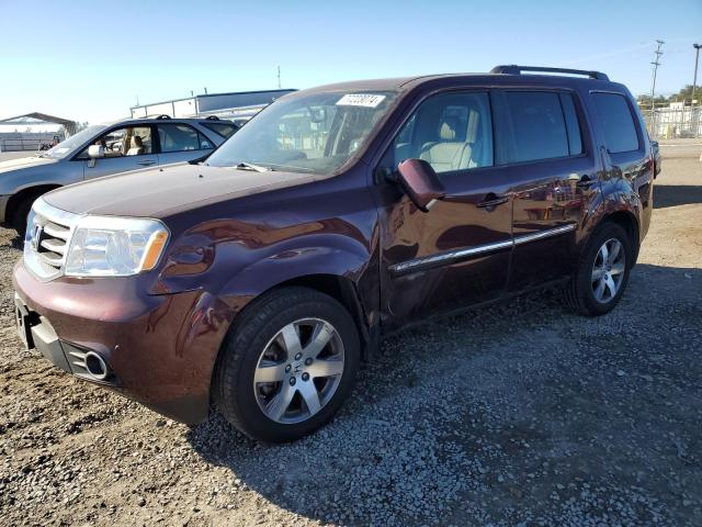 HONDA PILOT TOUR 2014 with VIN 5FNYF3H97EB021779 - Photo from auction