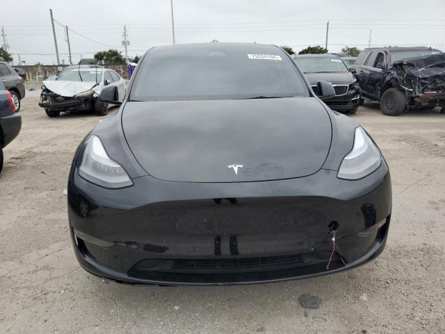 Photo 5 from auction – 2022 TESLA MODEL Y with VIN 7SAYGDEF9NF463382