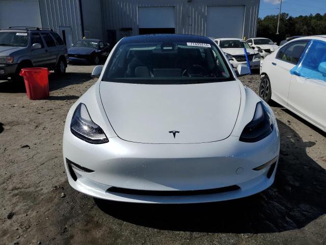 Photo 5 from auction – 2022 TESLA MODEL 3 with VIN 5YJ3E1EB0NF308082