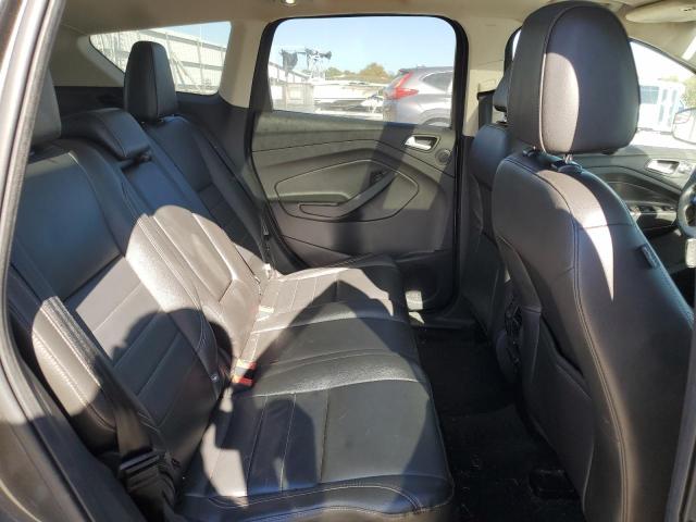 Photo 11 from auction – 2016 FORD ESCAPE TIT with VIN 1FMCU9J94GUA57142