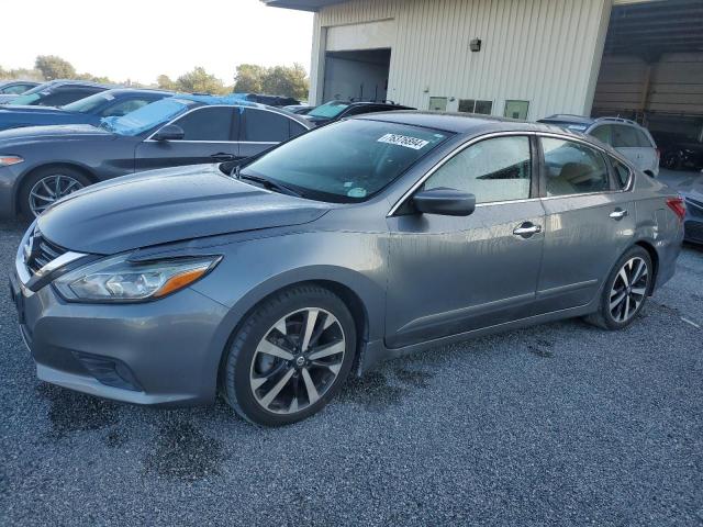 NISSAN ALTIMA 2.5 2018 with VIN 1N4AL3AP3JC273867 - Photo from auction