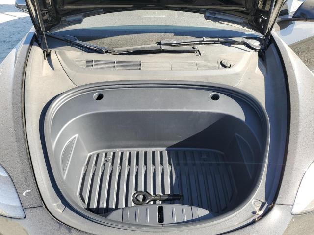 Photo 11 from auction – 2022 TESLA MODEL 3 with VIN 5YJ3E1EB4NF205103