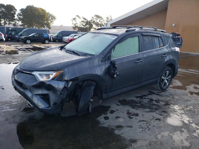 TOYOTA RAV4 XLE 2017 with VIN JTMRFREV1HD215874 - Photo from auction