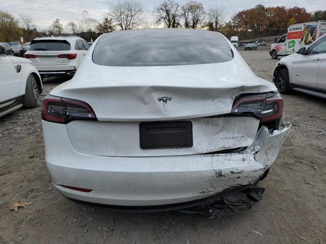 Photo 6 from auction – 2022 TESLA MODEL 3 with VIN 5YJ3E1EB6NF265576