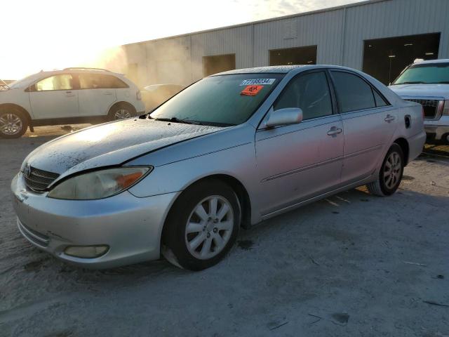TOYOTA CAMRY LE 2003 with VIN 4T1BF30KX3U039908 - Photo from auction